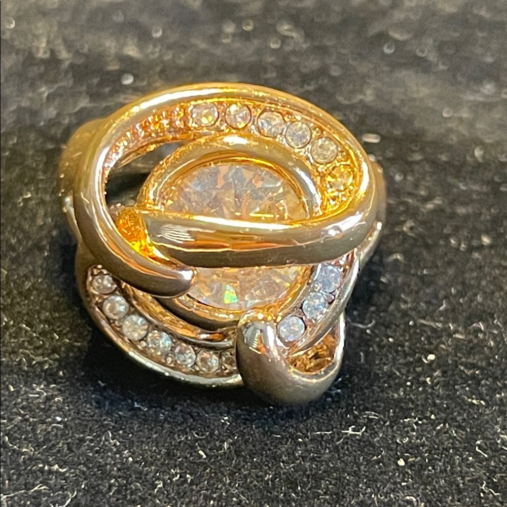 Spiraling Crystals Crown a 5ct Diamond in Blinding Rose Gold Brilliance